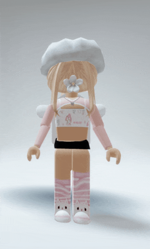 a girl with a flower in her hair is wearing a white hat and a crop top with my melody on it