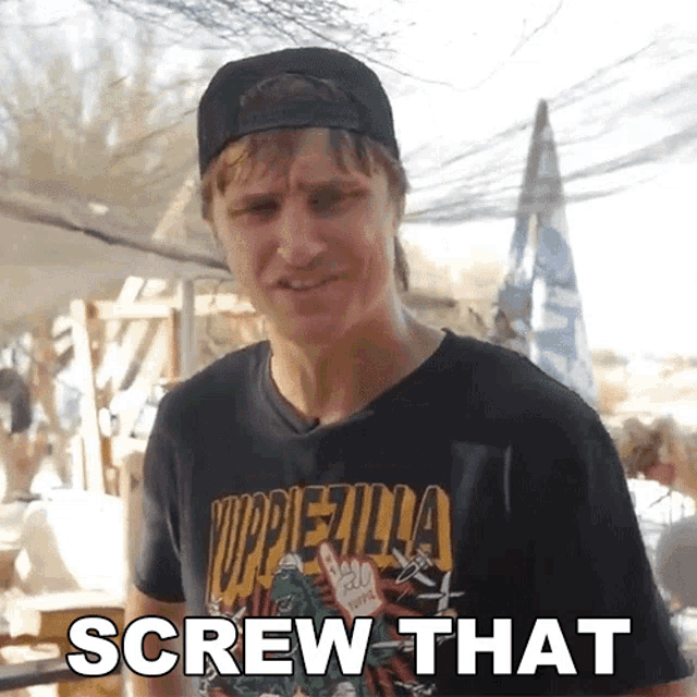 a man wearing a t-shirt that says screw that on it