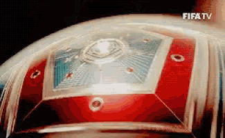 a close up of a soccer ball with fifa tv written on the bottom .