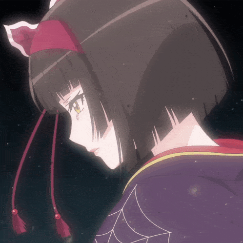 a close up of a girl 's face with a red headband