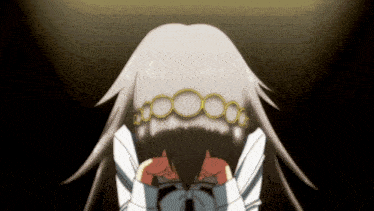 a girl with a necklace on her head is covering her face with her hands