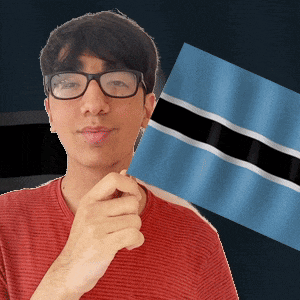 a young man wearing glasses is holding a blue and white flag