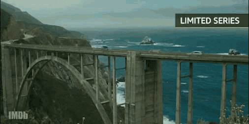 a bridge over a body of water with a sign that says ' limited series ' on it