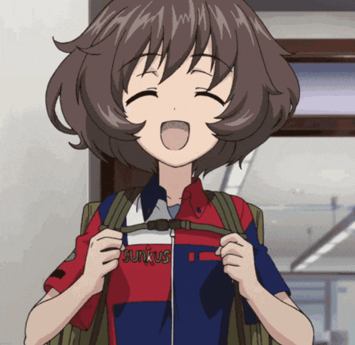 a girl wearing a shirt that says sunkus is smiling