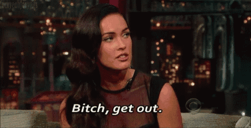 a woman is sitting on a couch and saying " bitch get out "