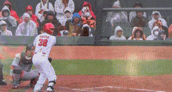 a baseball player with the number 38 on his back