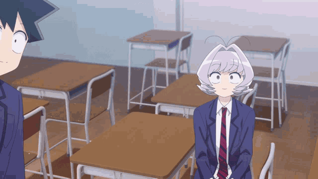a girl with purple hair is sitting in a classroom