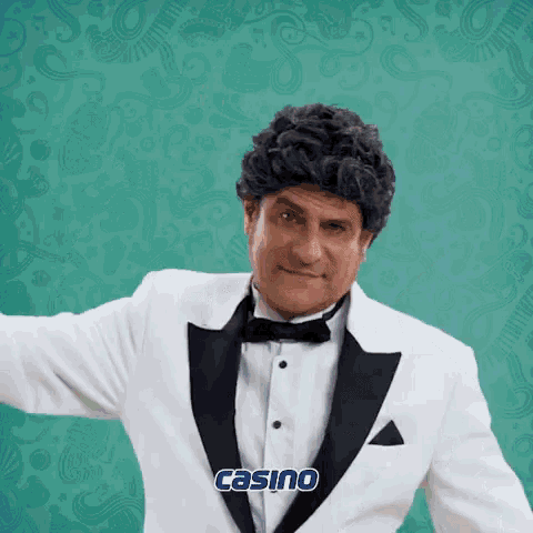 a man in a tuxedo with the word casino on the bottom right