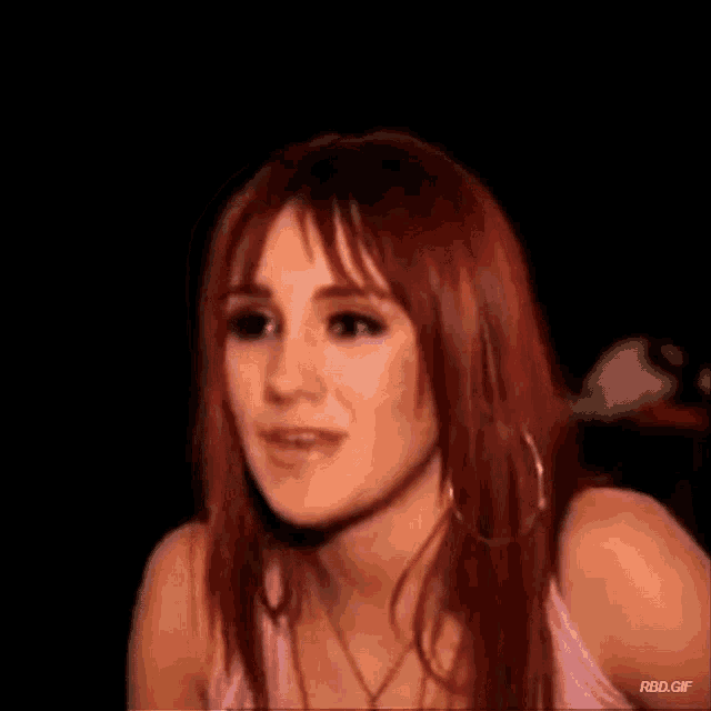 a close up of a woman 's face with the words rbd.gif below her