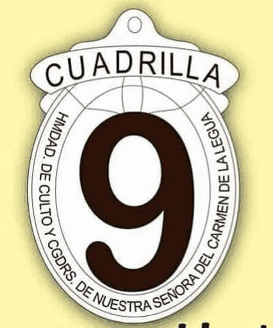 a black and white emblem with the number nine in the center .
