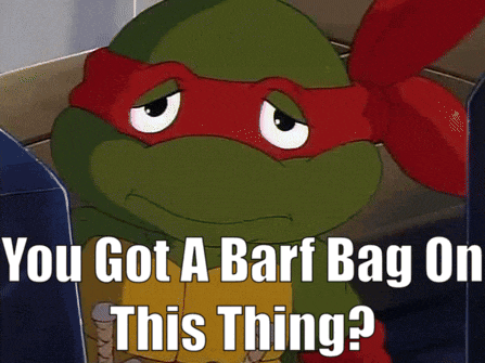 a teenage mutant ninja turtle with a caption that says " you got a barf bag on this thing "