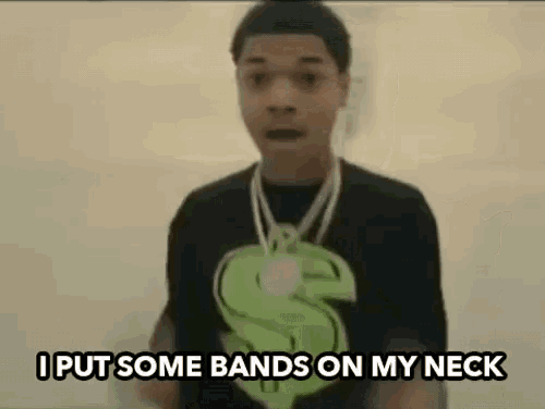 a young man wearing a dollar sign necklace and a t-shirt that says `` i put some bands on my neck ''
