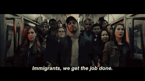 a group of people on a bus with the words immigrants we get the job done written below them