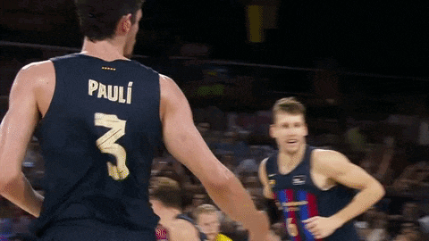 a basketball player with the name pauli on his back