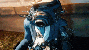 a person wearing a suit and tie with a gas mask on their head .
