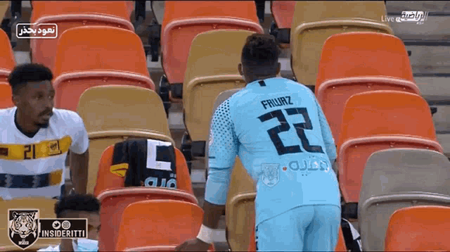a soccer player with the number 22 on their jersey