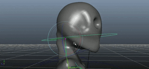 a 3d model of a person 's head has a green arrow pointing to the left