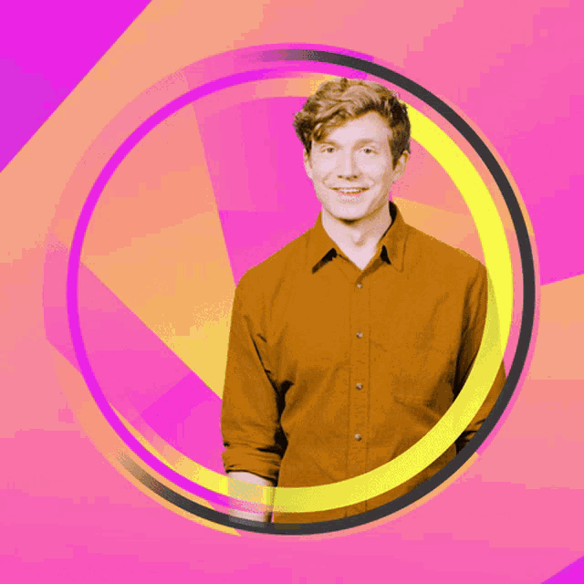 a man in an orange shirt is standing in a circle