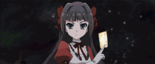 a close up of a girl with a red bow on her hair