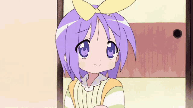 a girl with purple hair and blue eyes is wearing a yellow bow
