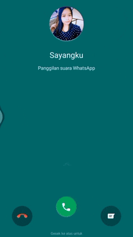 a girl sitting in a car with the words sayangku on the bottom