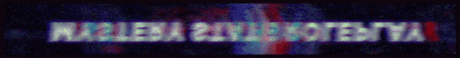a blurred image of a sign that says ' hazlena ' on it