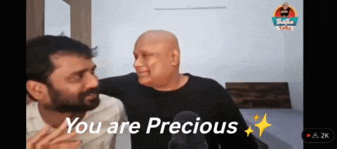 two men are talking to each other with the words you are precious