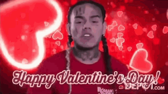 a man with dreadlocks is standing in front of a red background with hearts and the words `` happy valentine 's day ! ''