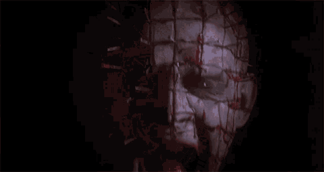 a close up of a face with blood coming out of it