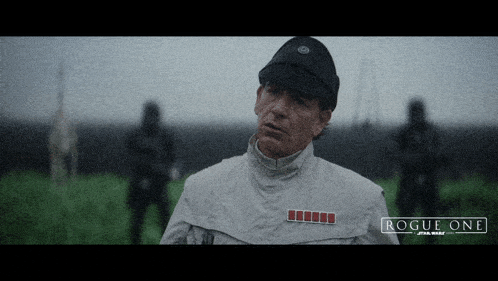 a poster for rogue one star wars shows a man in a white jacket