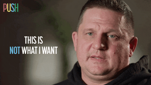 a man says " this is not what i want " in front of a sign that says push
