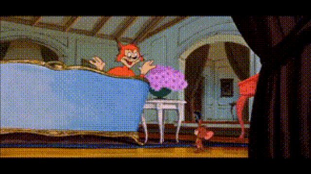 a cartoon cat is sitting on a blue couch in a living room