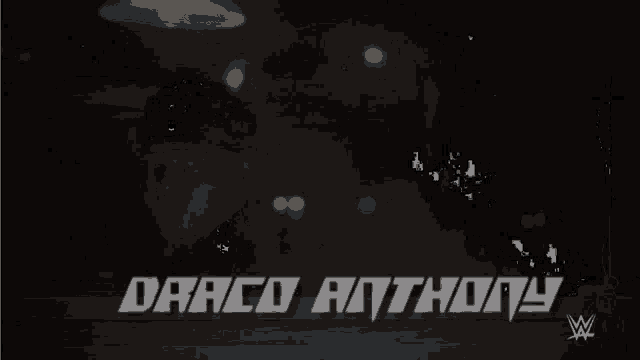 a dark background with the name darco anthony written on it