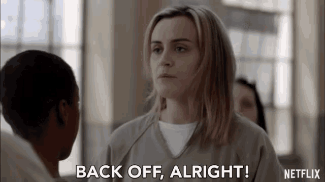 a netflix ad shows a woman in a jail cell and says back off alright
