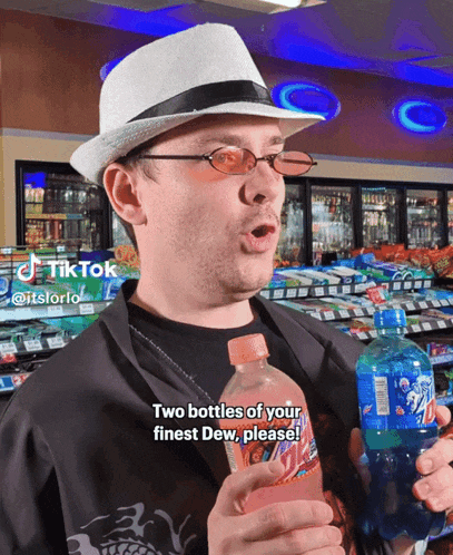 a man in a hat and glasses holds up a bottle of soda and says two bottles of your finest dew please