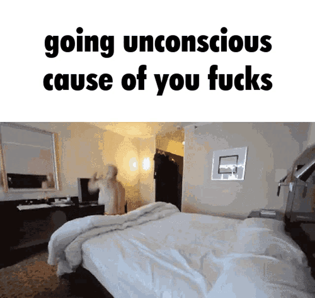 a hotel room with a bed and the words going unconscious cause of you fucks