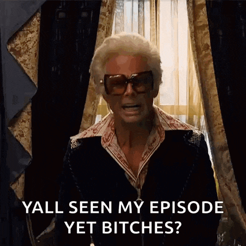 a man wearing sunglasses and a suit says yall seen my episode yet bitches ?