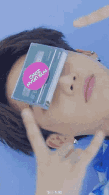 a blurry picture of a person with a book on their face that says ' i love you ' on it