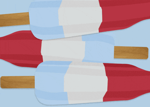 red white and blue popsicles are stacked on top of each other on a blue background