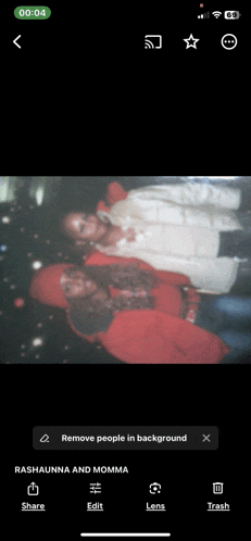 a phone screen shows a picture of rashaunna and momma and says remove people in background
