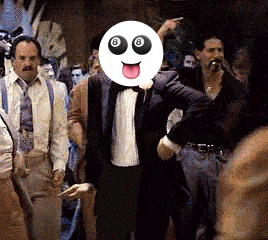 a man in a tuxedo has a smiley face on his face with the number 8 on it
