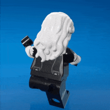 a black and white lego figure with a beard and white hair