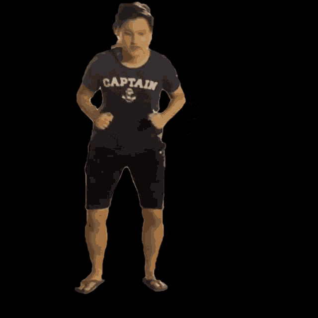 a man wearing a shirt that says captain is running