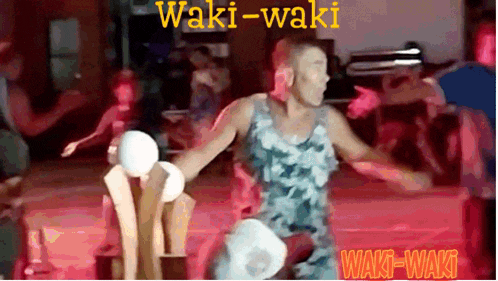 a picture of a man dancing with the words ' waki-waki ' at the bottom