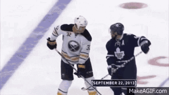 two hockey players on the ice with the date september 22 2013 on the bottom