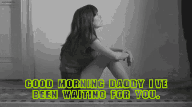 a woman sits on the floor with the words " good morning daddy ive been waiting for you "