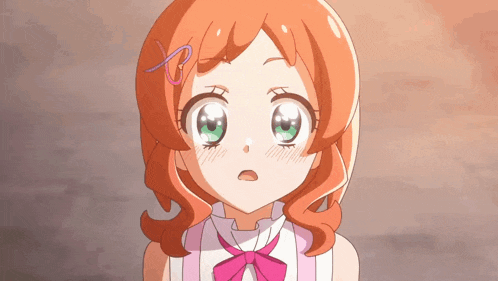 a girl with orange hair and green eyes has a pink bow in her hair