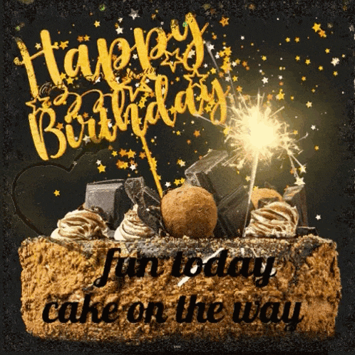 a birthday cake with sparklers and the words " have a happy birthday "