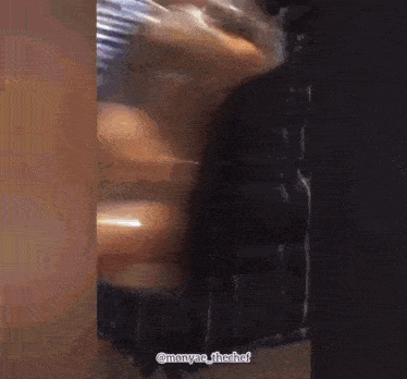 a blurred image of a person with the caption monyaa_ihecha