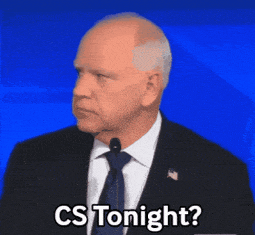 a man in a suit and tie says " cs tonight " in front of a blue background